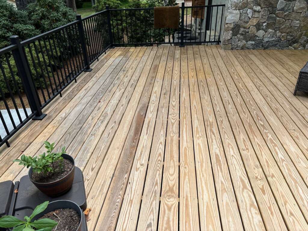 Greenville backyard featuring a freshly treated deck after deck staining in Greenville SC